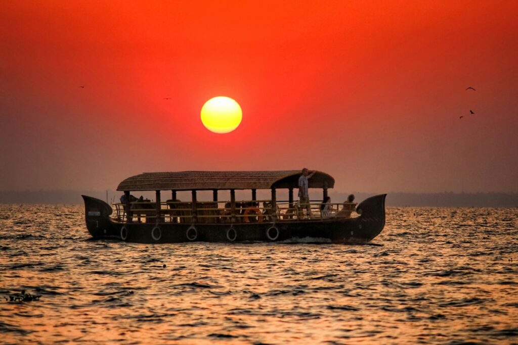 Sunset boat cruise in Kumarakom backwaters Kerala
